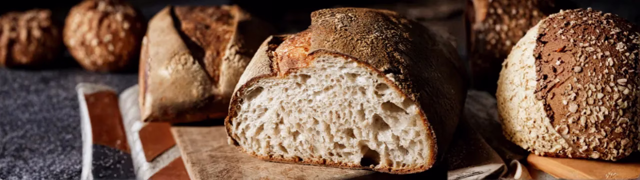 Freshly baked healthy sourdough bread with a golden crust, handcrafted at El Epicureo bakery in Cómpeta